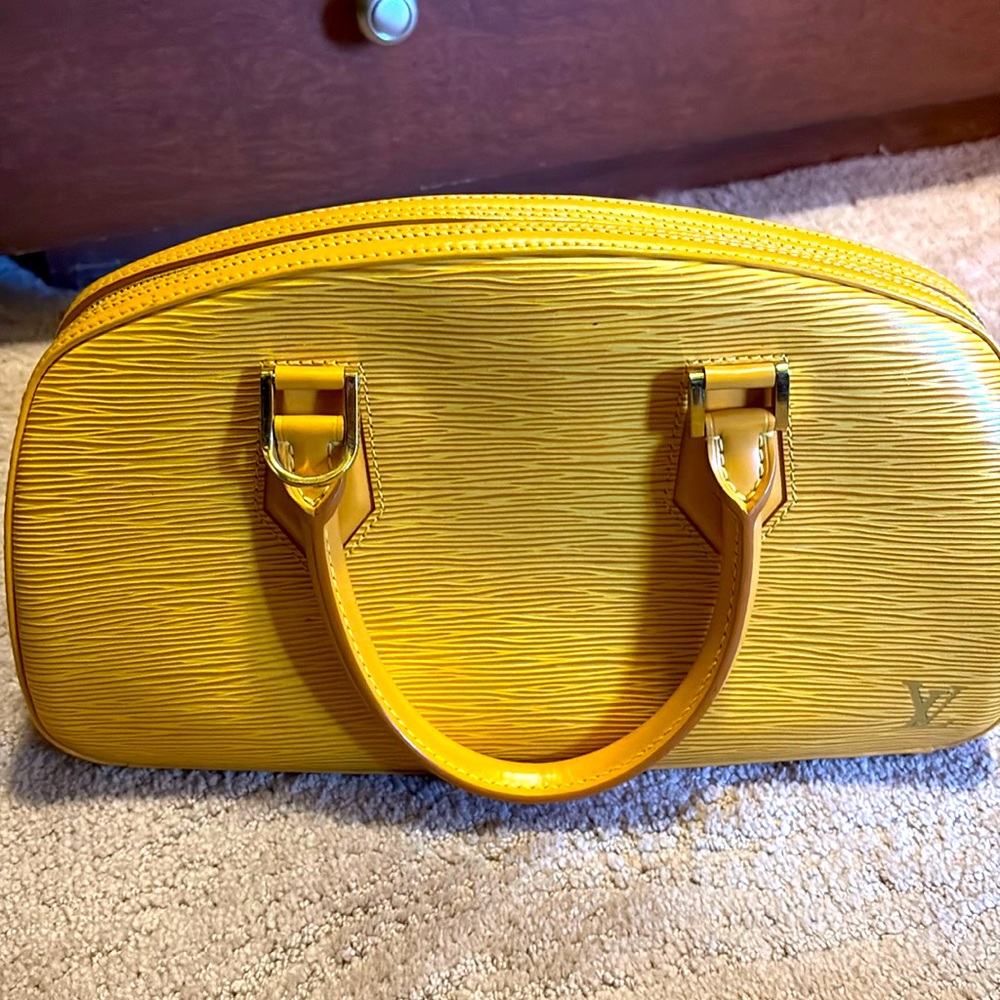 Louis Vuitton satchel only used once